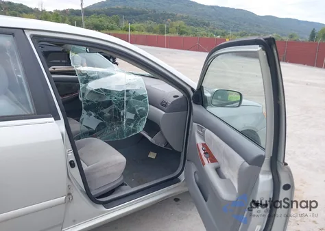 2003 Toyota Corolla Le из США, поврежденный, VIN 2T1BR32E83C012027